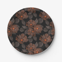 Orangene und braune Blumen auf schwarzem Hintergru