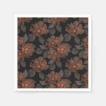Orangene und braune Blumen auf schwarzem Hintergru