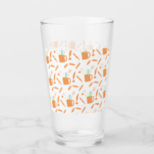 Orangenschreibwerkzeuge - weißes hintergrundes Mus Glas