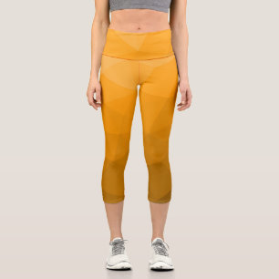 Oranger geometrischer Maschenverlauf mit Farbverla Capri Leggings