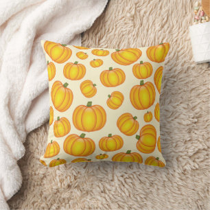 Oranges Karikaturen-Kürbismuster Kissen