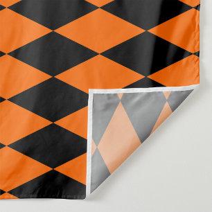 Oranges Schwarzes Harlekin-Diamant-Schachbrett-Des Stoff