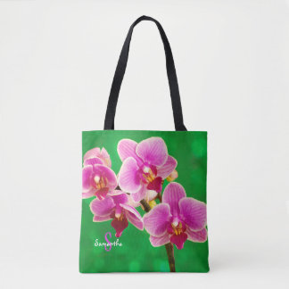 Orchidée violette sur sac fourre-tout vert