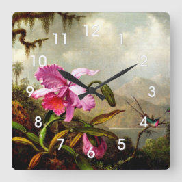 Orchideen und Hummingvögel in der Nähe eines Bergs Quadratische Wanduhr