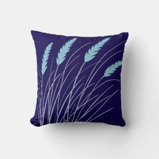 oreiller bleu marine avec herbe de plage