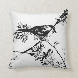 Oreillers noirs et blancs d'oiseau