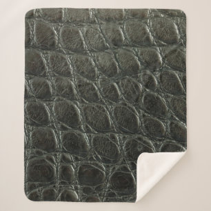Originelle schwarze Alligatorledertextur, nah  Sherpadecke