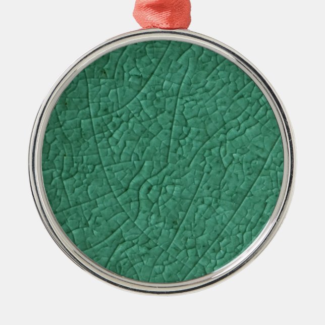Ornament aus grünem Stein Metall (Vorne)