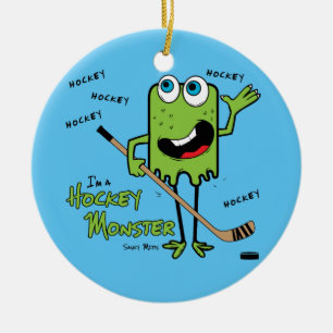 Ornement de Noël du monstre de hockey vert