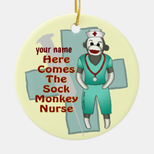 Ornement de nurse en singe en chaussette