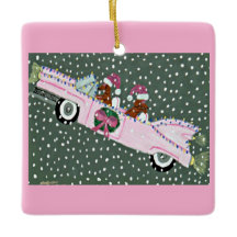 Dachshunds à Noël dans une décapotable rose