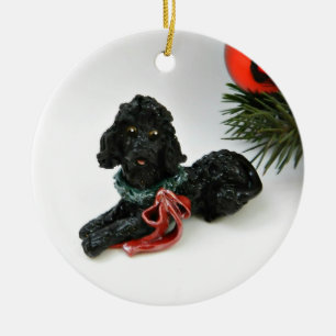 Ornement en céramique de chien de caniche