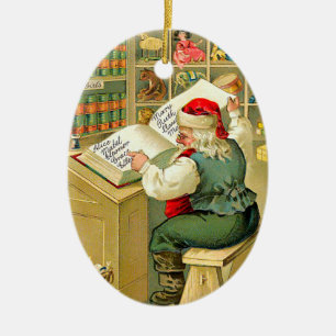Ornement En Céramique Père Noël vérifiant sa liste