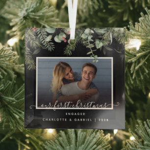 Ornement En Verre Premier Noël dans la verdure engagée Photo