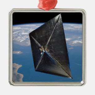 Ornement Métallique Concept artistique de NanoSail-D dans l'espace