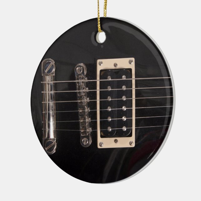 Ornement noir élégant de guitare électrique (Gauche)