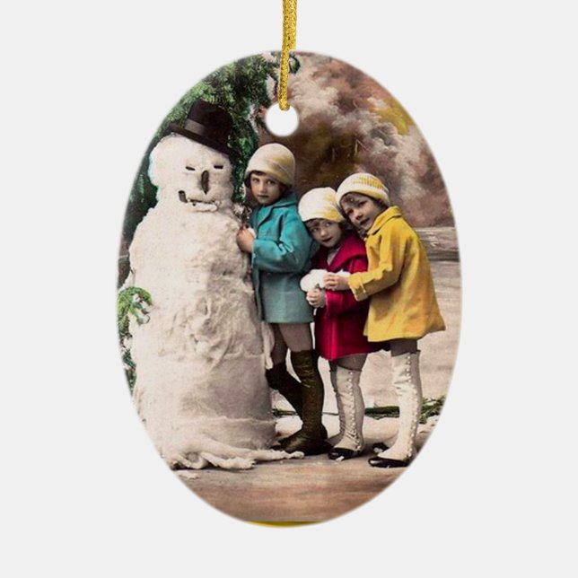 ORNEMENT OVALE EN CÉRAMIQUE LES ENFANTS AVEC LA NEIGE (Devant)