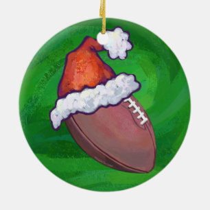 Ornement Rond En Céramique Football de Santa Hat sur Vert