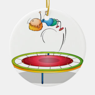 Ornement Rond En Céramique Un garçon jouant le trempoline