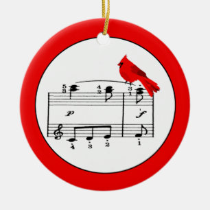 Ornement rouge de cardinal et de Noël de musique