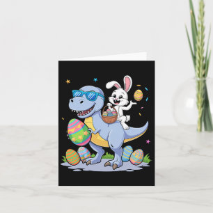 Osterdinosaurier T-rex und sonniges Holding Farbe Karte