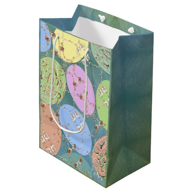 Ostereier auf blauem grünem Umschlagpapier für die Mittlere Geschenktüte (Vorderseite Schrägansicht)