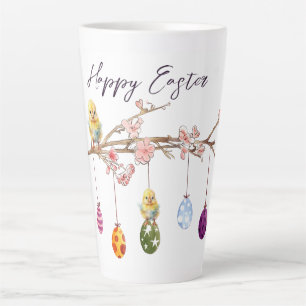 Ostereier auf blühenden Branchen glückliche Osterf Milchtasse