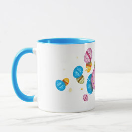 Ostereier und Gänseblümchen Tasse