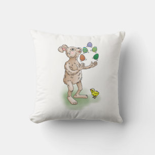 Osterhase jongliert kissen