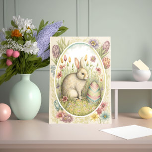 Osterhase mit dekoriertem Ei und Blume Karte