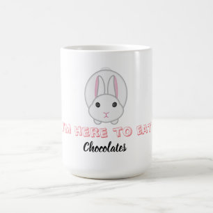 Osterhase warte Schokolade zu essen Kaffeetasse