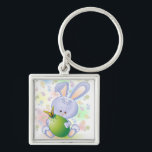 Osterkaninchen mit Ei und Blume Schlüsselanhänger<br><div class="desc">Niedlicher Osterhase mit Ei</div>