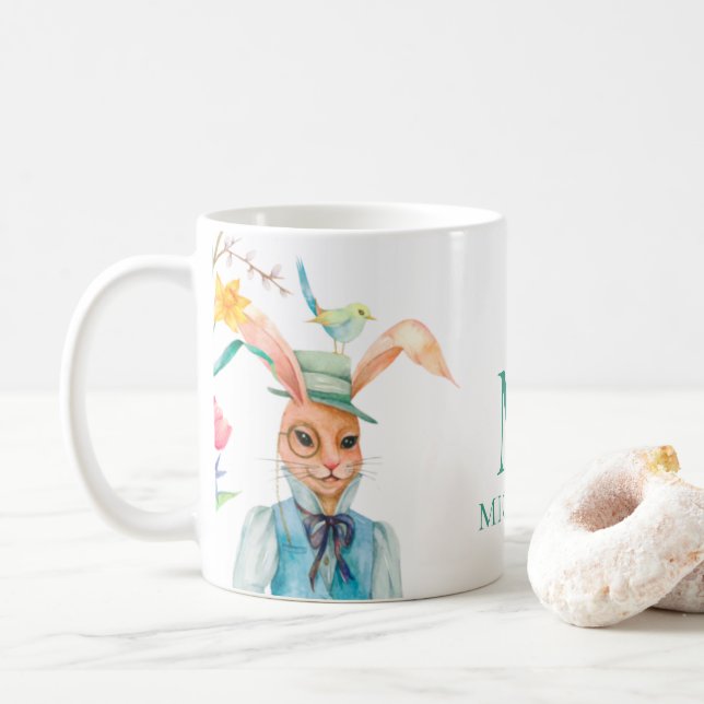OsterNiedliches Kaninchenfrühlingsprofil Monogramm Kaffeetasse (Mit Donut)