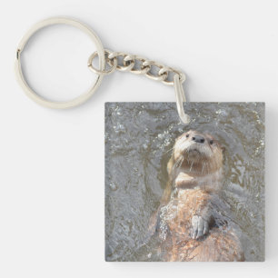 Otter-Rückseiten-Floss Schlüsselanhänger
