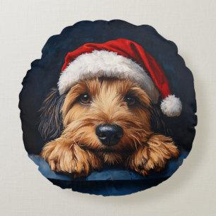 Otterhound in einer Weihnachtsmannmütze Rundes Kissen