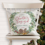 Our First Christmas Engaged Winter Wreath Photo Kissen<br><div class="desc">Celebrate your First Christmas Engaged with this beautiful festive holiday design throw pillow. It features a watercolor holiday wreath comprised of snow berries, pine cones and sprigs, red berries and faux bronze bells, on a natural looking faux birch bark background. "Christmas" and "Engaged" are printed in festive red hand lettered...</div>