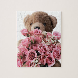 ours en peluche au puzzle rose