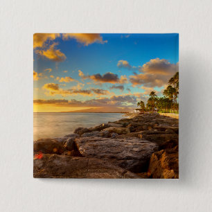 Ozean-Sonnenuntergang über Felsen und Palme Button