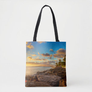 Ozean-Sonnenuntergang über Felsen und Palme Tasche