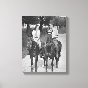 Paar beim Reiten auf Pferden Leinwanddruck
