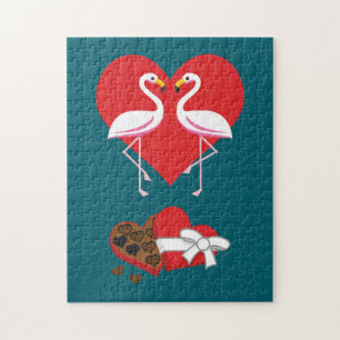 Paar Rosa Flamingo und eine Schachtel Pralinen