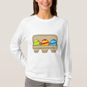 Packung mit bunten Ostereiern aus Cartoon T-Shirt