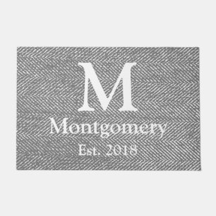 Paillasson Arête de hareng grise moderne et monogramme blanc