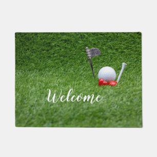 Paillasson Ball de golf avec deux coeurs rouges sur herbe ver