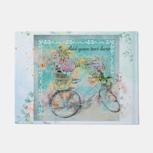 Paillasson Bicyclette avec des paniers de fleur sur la toile