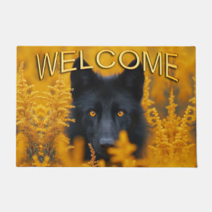 Paillasson Chien noir avec des yeux d'or étonnants Bienvenue