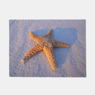 Paillasson Étoiles de mer sur le sable blanc