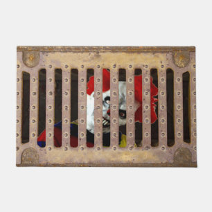 Paillasson grille d'égout avec clown effrayant