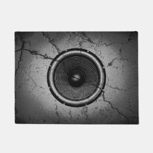 Paillasson Haut-parleur de musique sur un mur fissuré