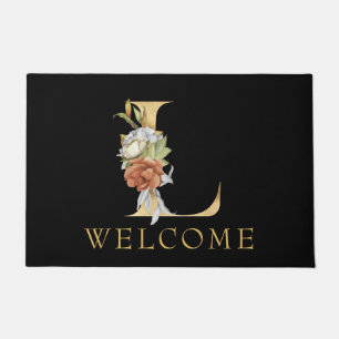 Paillasson Monogramme or classique L avec arrangement floral